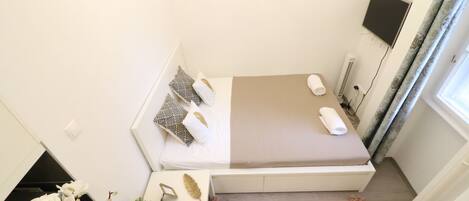 Cortinas blackout, tabla de planchar con plancha y wifi gratis