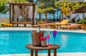 Outdoor pool, open 8:00 AM to 9:00 PM, free cabanas, sun loungers