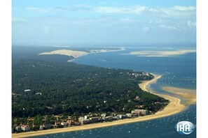 On the beach, sun-loungers