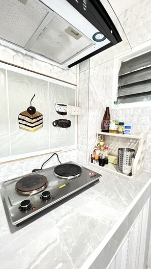 Fridge, microwave, cookware/dishes/utensils