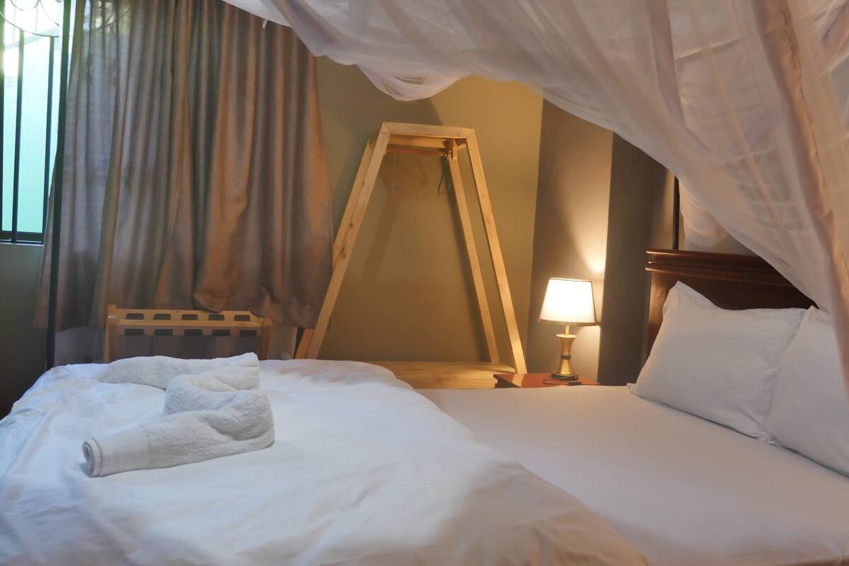 Camera familiare | Biancheria da letto ipoallergenica, Wi-Fi gratuito