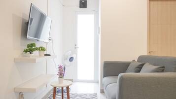 Apartment, 2 Bedrooms | Living room | TV