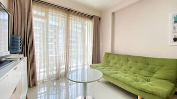 Apartment, 2 Bedrooms | Living room | TV