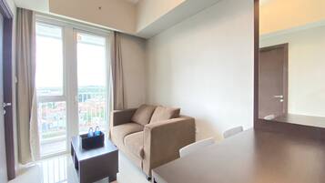 Apartment, 2 Bedrooms | Living room | TV