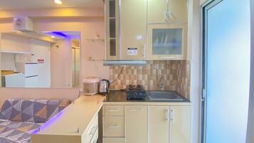 Estúdio | Cozinha privada | Geladeira, cooktop, talheres/pratos/utensílios de cozinha