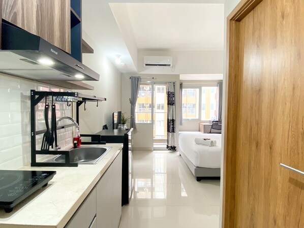 Private kitchen - Modern Look Studio Room at LRT City Jatibening Apartment (Bekasi)