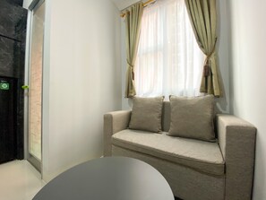 Living room - Modern Studio At 12Th Floor Transpark Juanda Bekasi Timur Apartment (Bekasi)