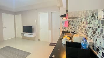 Apartment, 2 Bedrooms | Private kitchen | Fridge, stovetop, cookware/dishes/utensils