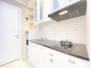 Private kitchen - Nice Studio Room At Grand Asia Afrika Apartment (Bandung)