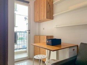 Apartment, 2 Bedrooms | Living room | TV - Warm And Minimalist 2Br At Northland Ancol Apartment (Jakarta)