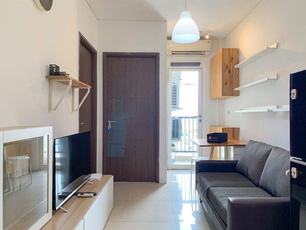 Apartment, 2 Bedrooms | Living room | TV - Warm And Minimalist 2Br At Northland Ancol Apartment (Jakarta)