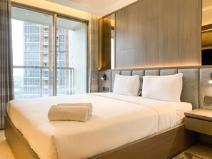 Studio | Free WiFi - Warm And Modern Look Studio Room At Gold Coast Apartment (Jakarta)