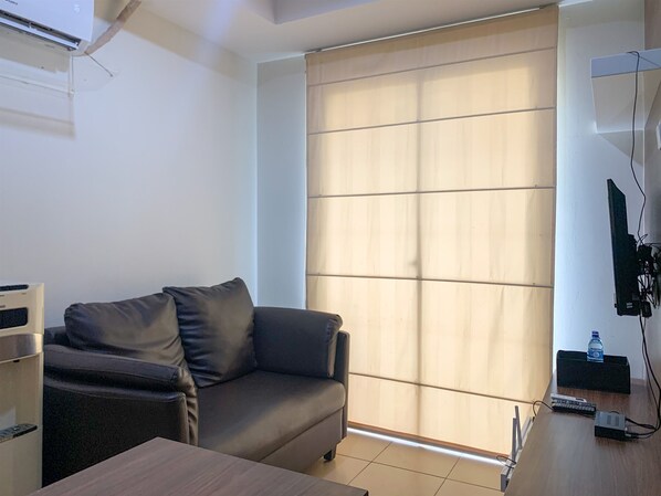 Apartment, 1 Bedroom | Living room | TV
