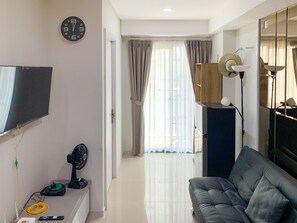 Apartment, 2 Bedrooms | Living room | TV - Comfort And Enjoy Living 2Br At Daan Mogot City Apartment (Jakarta)