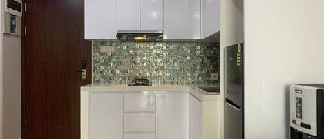 Apartment, 2 Bedrooms | Private kitchen | Fridge, stovetop, cookware/dishes/utensils
