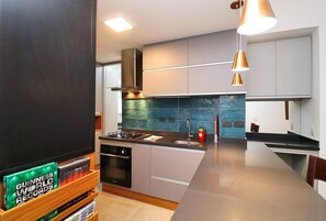 Microwave, oven, blender, cookware/dishes/utensils