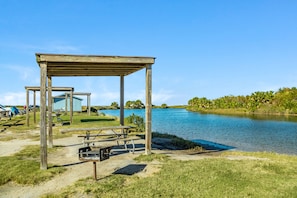 Outdoor dining - Spacious Beachside Home w/ Long Gulf View, Covered Deck & Huge Primary Suite (Galveston)