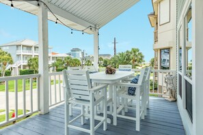 Outdoor dining - Spacious Beachside Home w/ Long Gulf View, Covered Deck & Huge Primary Suite (Galveston)