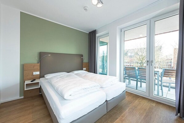 2 bedrooms, free WiFi - Helles Familienapartment in Strandnähe mit Sonniger Loggia & Sauna im Haus! (Nordseeheilbad Langeoog)