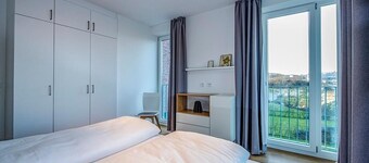 Top Apartment in Strandnähe mit Loggia, Strandkorb, Zwei Bädern & Sauna im Haus!