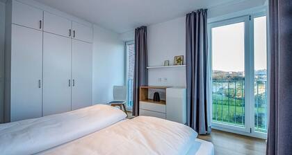 Top Apartment in Strandnähe mit Loggia, Strandkorb, zwei Bädern & Sauna im Haus!