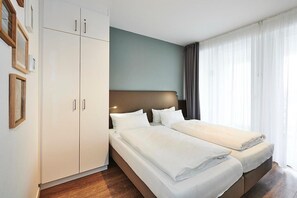 2 slaapkamers, een strijkplank/strijkijzer, gratis wifi