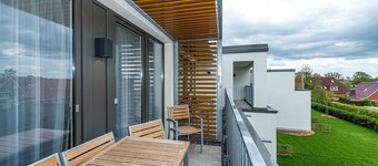 Nordseenahes Ferienapartment mit Balkon, Parkplatz, Schwimmbad- & Saunanutzung