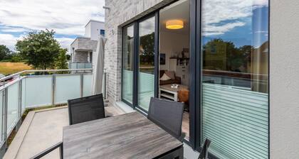 Great, modern vacation apartment for 4 people with a beautiful balcony near the beach
