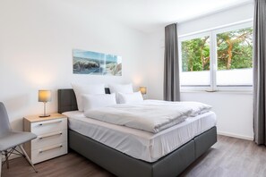2 slaapkamers, een strijkplank/strijkijzer, gratis wifi, beddengoed