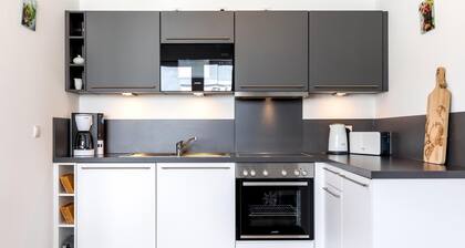 Exklusives Apartment mit Dachterrasse und 2 Bädern - Saunabereich im Haus!