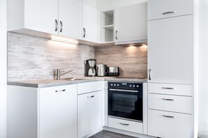 Réfrigérateur, four, plaque de cuisson, lave-vaisselle