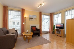 TV, DVD player, books, stereo