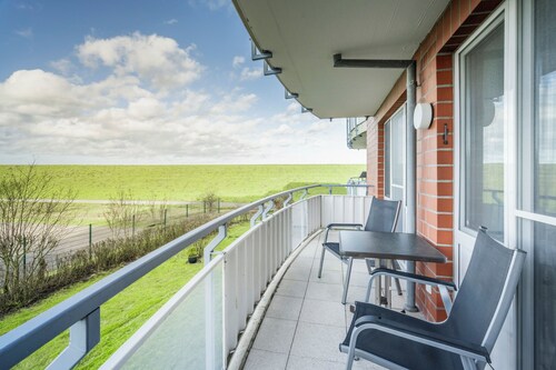 Strandnahe 3-Zimmer Ferienwohnung mit Balkon und direkt am Nordseedeich gelegen