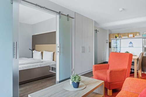 Ruhige, Schöne Wohnung in Strandnähe mit Sauna und Balkon mit Blick ins Grüne