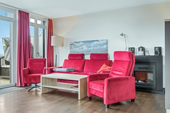 TV, fireplace, books, stereo