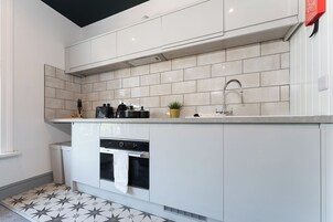 Superior Studio | Private kitchen | Full-size fridge, microwave, oven, stovetop