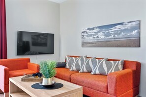 TV, fireplace, books, stereo