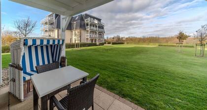 Strandnahe, familienfreundliche Ferienwohnung mit Sauna, Terrasse und Strandkorb