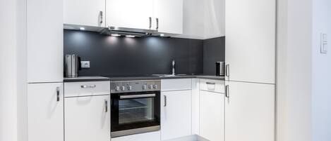 Réfrigérateur, four, plaque de cuisson, lave-vaisselle