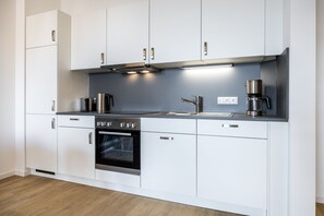 Réfrigérateur, four, plaque de cuisson, lave-vaisselle