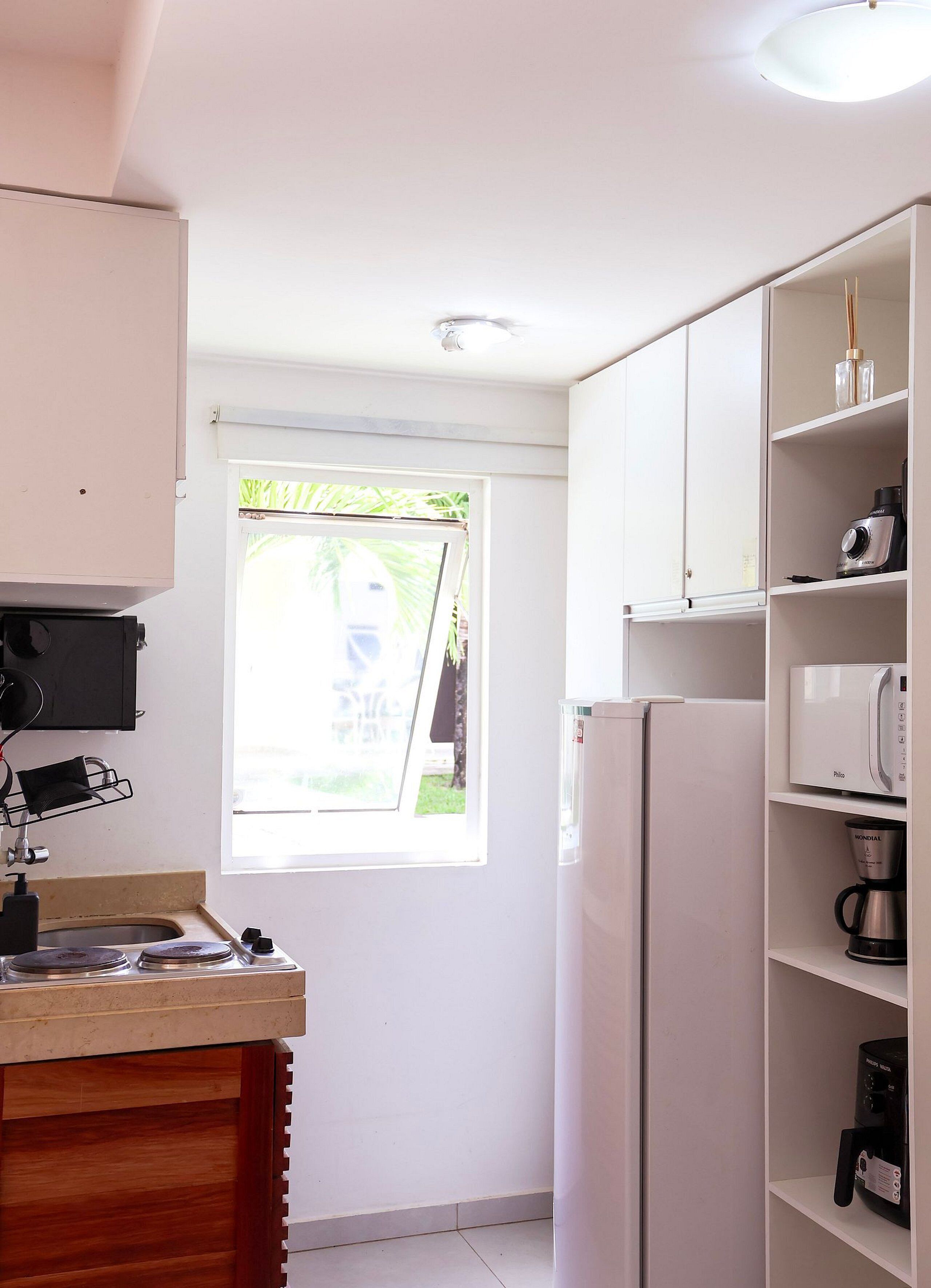 Apartamento família | Cozinha privada | Geladeira, micro-ondas, talheres/pratos/utensílios de cozinha