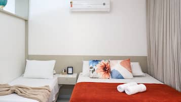 Departamento | Tabla de planchar con plancha, wifi gratis y ropa de cama