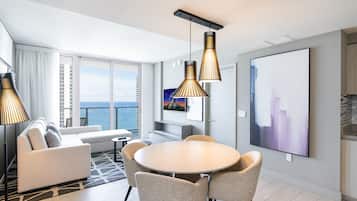Panoramic Condo | Living area | 43-inch flat-screen TV with cable channels, TV