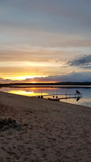 On the beach, sun loungers, beach towels