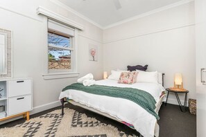 4 bedrooms, desk, iron/ironing board, travel cot