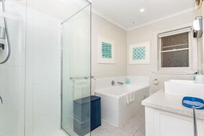 Bathtub, hair dryer, towels