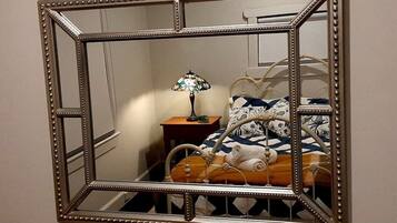 4 bedrooms, desk, iron/ironing board, travel cot