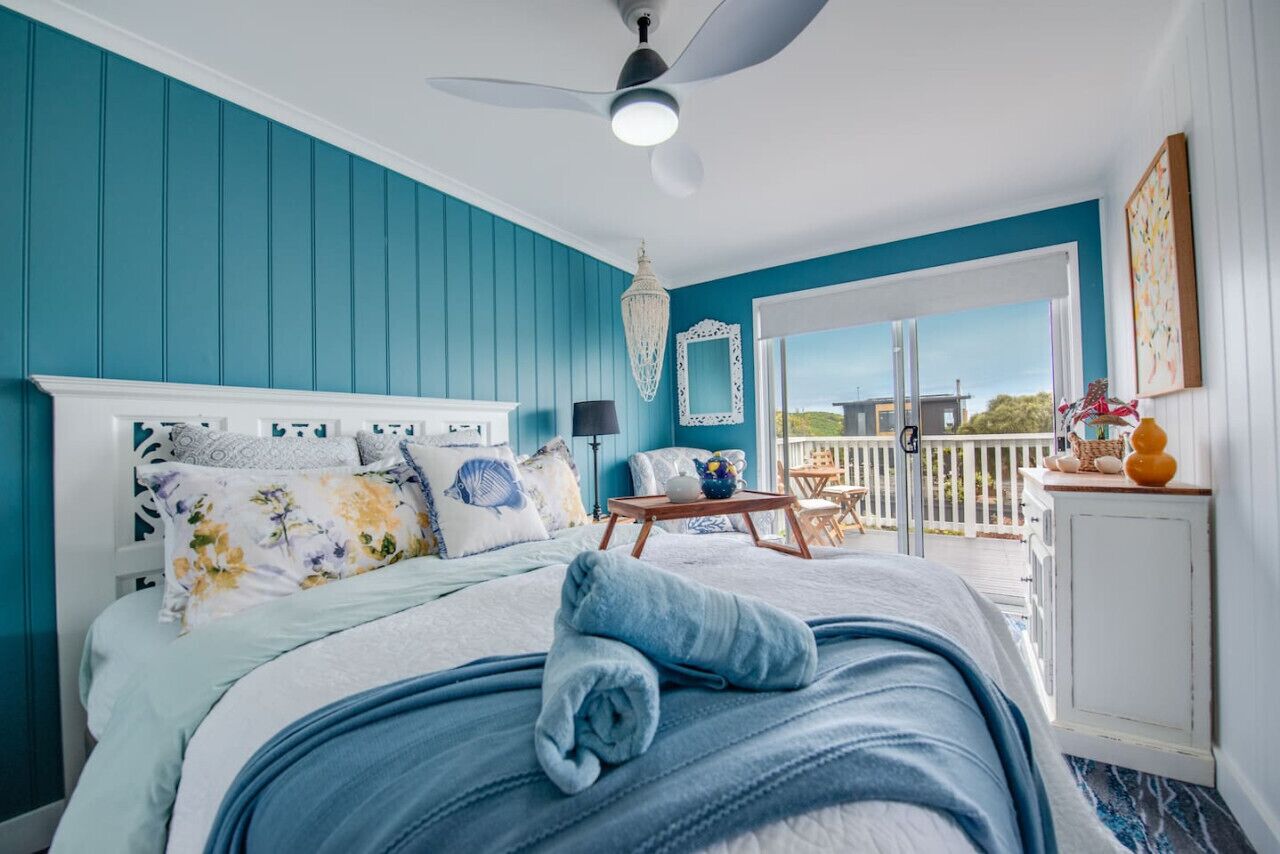 Main bedroom flows out onto it`s own private balcony. Linden provided on request. Ocean views
