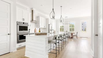 Fridge, coffee/tea maker, cookware/dishes/utensils