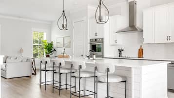 Fridge, coffee/tea maker, cookware/dishes/utensils